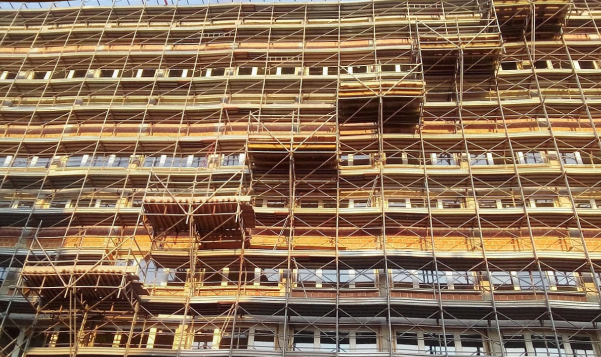 Heritage-listed unit renovation in New Farm with restored VJ walls